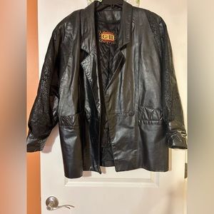 GIII leather coat. Paisley design on sleeves removable lining.